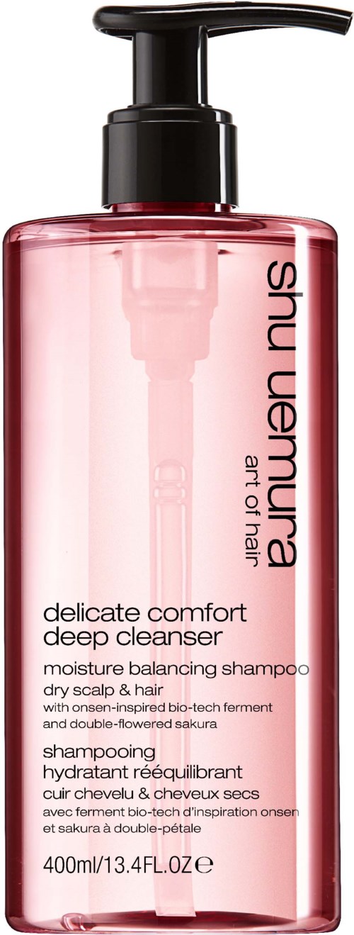 Rosa flaska med svart pump, märkt 'delicate comfort deep cleanser' för hår och hårbotten.