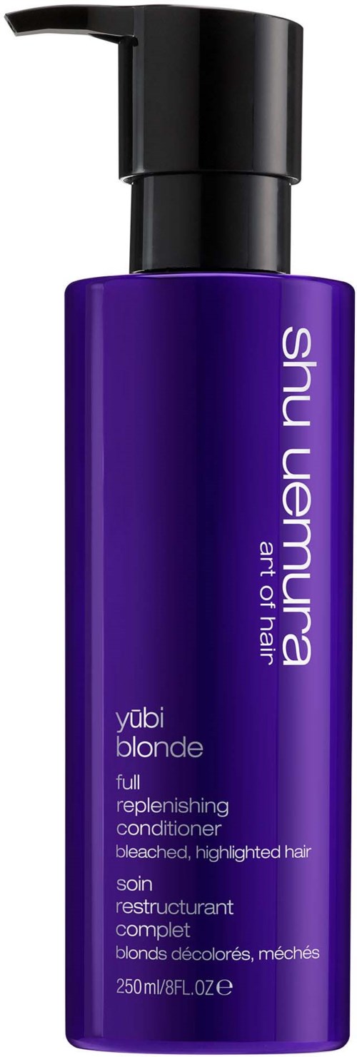 En lila flaska med Shu Uemura hårbalsam med svart pump, 250 ml.