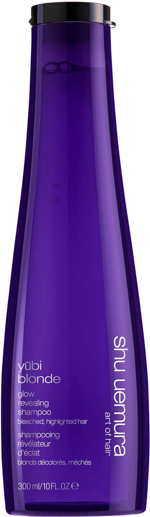 En lång, lila schampoflaska med svart lock, märkt 'shu uemura' och 'yubi blonde' i vitt text.