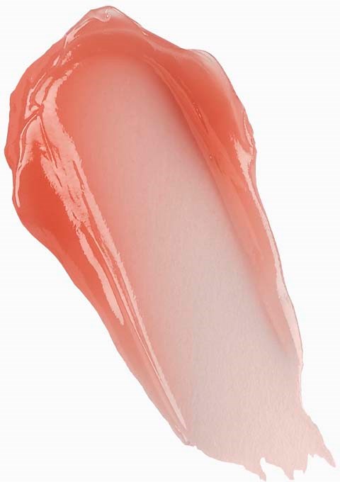 Et lag med ferskenfarget sminke med glatt, skinnende tekstur og lys gradient.
