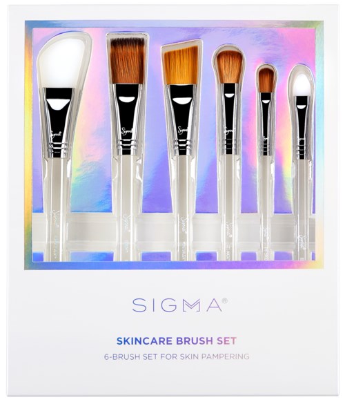 Seks sminkebørster med myke børster i en fargerik eske, merket Sigma skincare brush set for hudpleie.