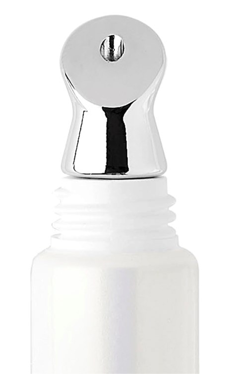 En vit flaska med ett metallmunstycke på toppen, förmodligen en spray- eller limbehållare.