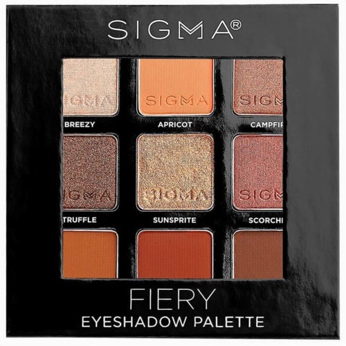 Nio ögonskuggor i en svart box med ett tydligt fönster, kallad Sigma Fiery Eyeshadow Palette.