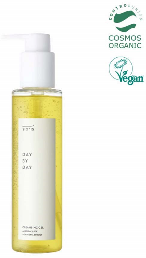 En genomskinlig flaska med gul rengöringsgel med pump, med logotyper som visar att den är ekologisk och vegansk.