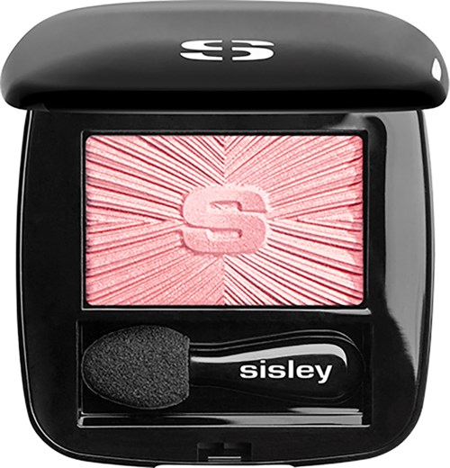Musta meikkipeite, jossa vaaleanpunainen poskipuna, sieni ja 'Sisley'-merkki sienen päällä.