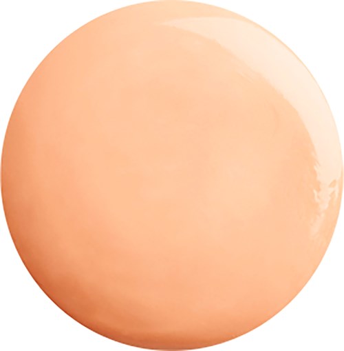 Et mykt ferskenfarget, rundt objekt som ligner på et egg eller en glatt stein.