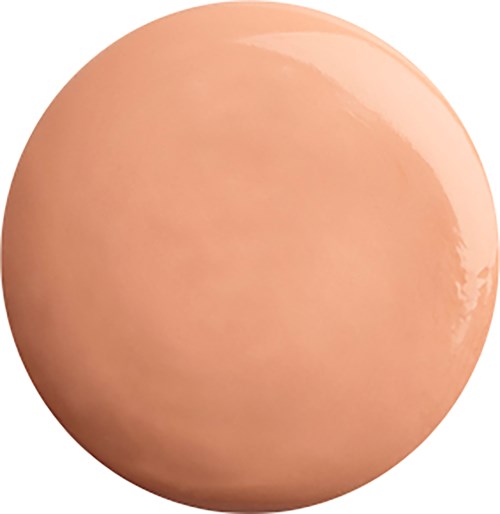 En jevn, rund, lys hudfarget objekt. Det ser ut som et egg.