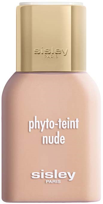 A bottle of Sisley Paris Phyto-Teint Nude makeup product in soft pink with a gold cap.