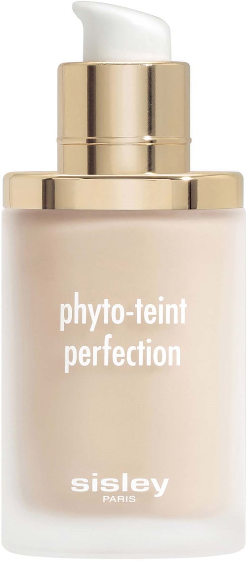 A bottle with a pump labeled 'phyto-teint perfection' by Sisley Paris, likely a skincare or makeup product.