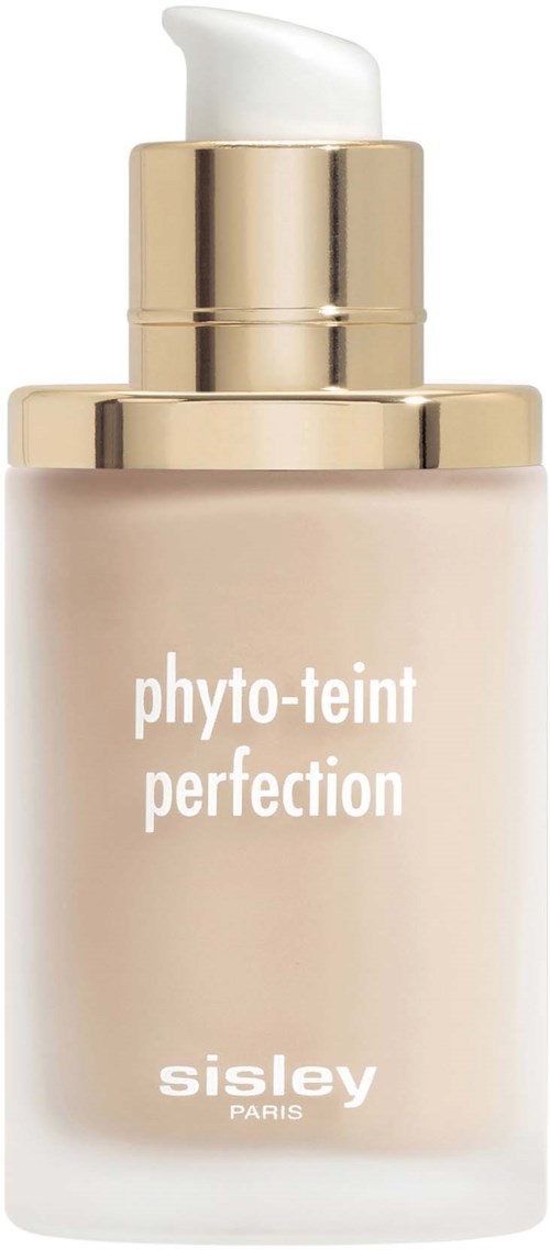 A beige bottle with gold accents labeled 'phyto-teint perfection' by Sisley Paris, likely skincare or makeup.