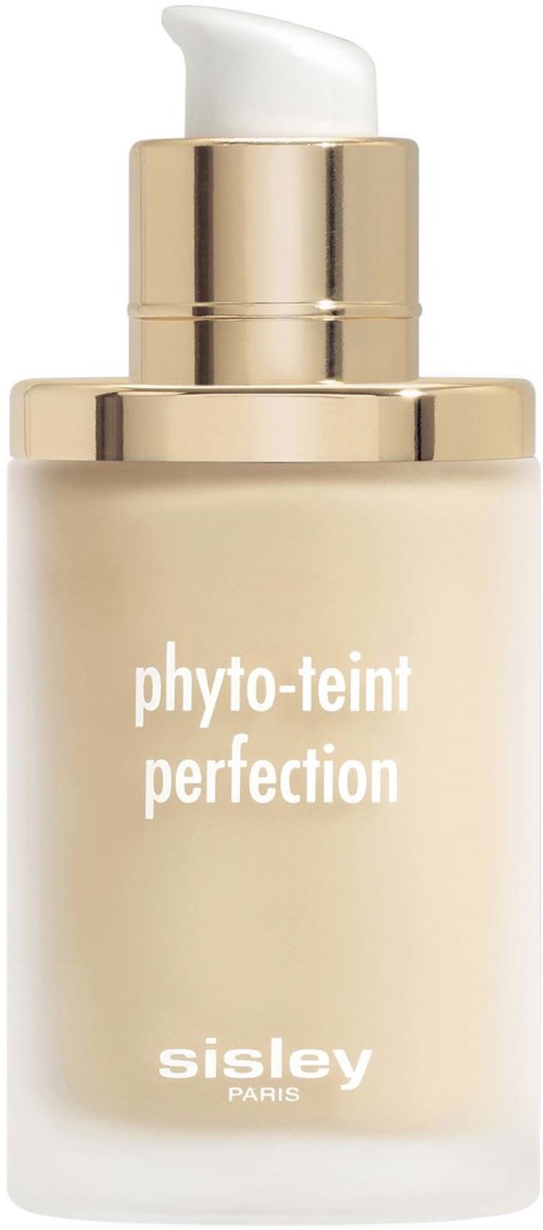 A beige pump bottle with a gold cap labeled "phyto-teint perfection" from Sisley Paris.