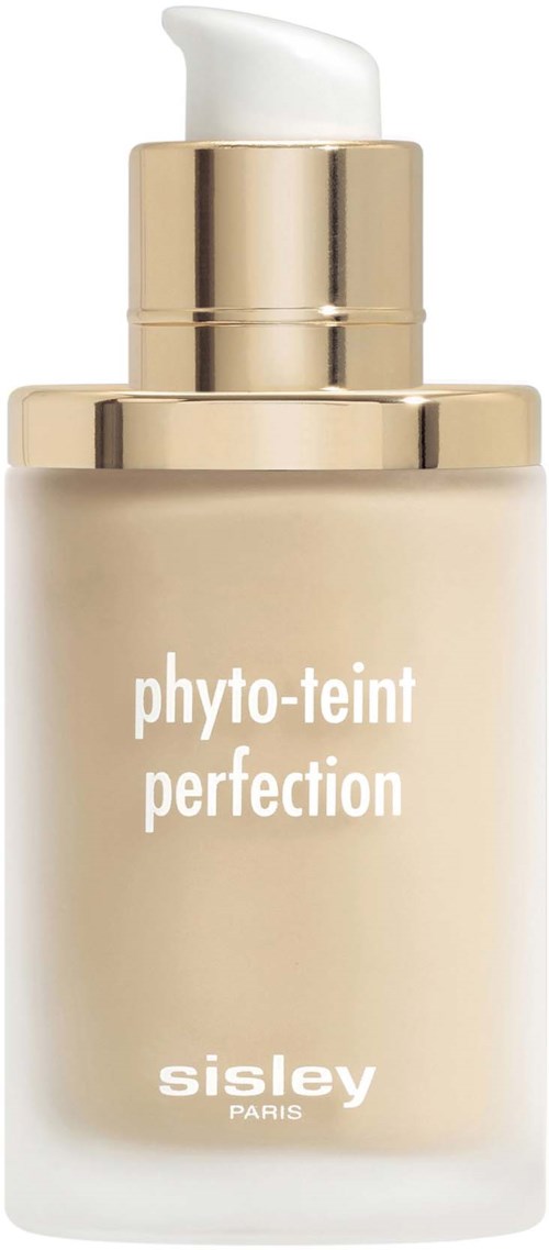 A cream bottle with a white pump, gold top, and the label 'phyto-teint perfection' by Sisley.