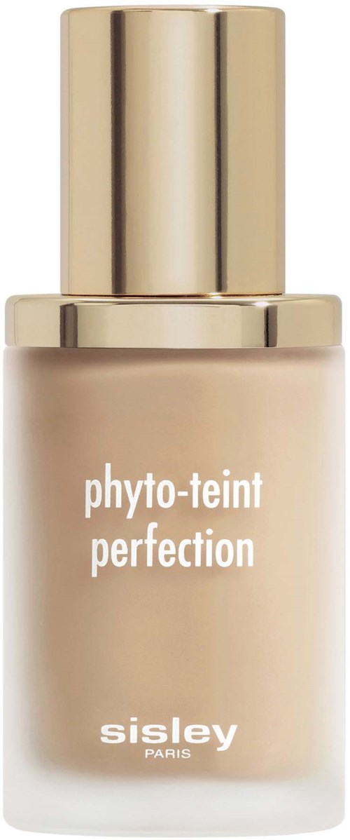 A beige bottle with a gold cap labeled 'phyto-teint perfection' by Sisley Paris.