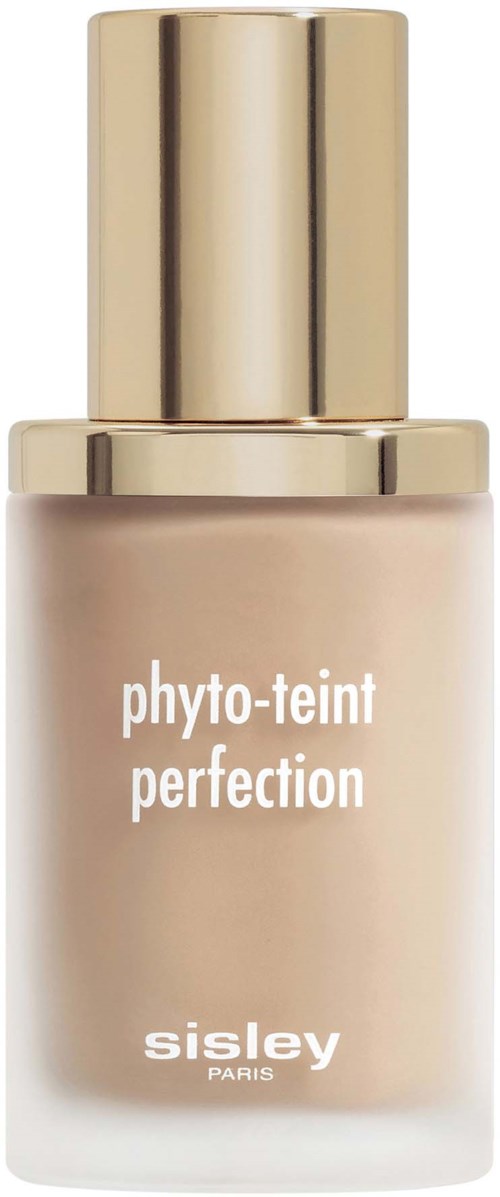 A beige foundation bottle with a gold cap, labeled 'phyto-teint perfections' by Sisley Paris.