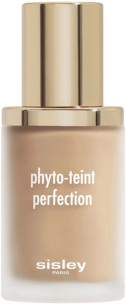 A beige cosmetic bottle with a gold cap and white text, labeled 'phyto-teint perfection' by Sisley Paris.