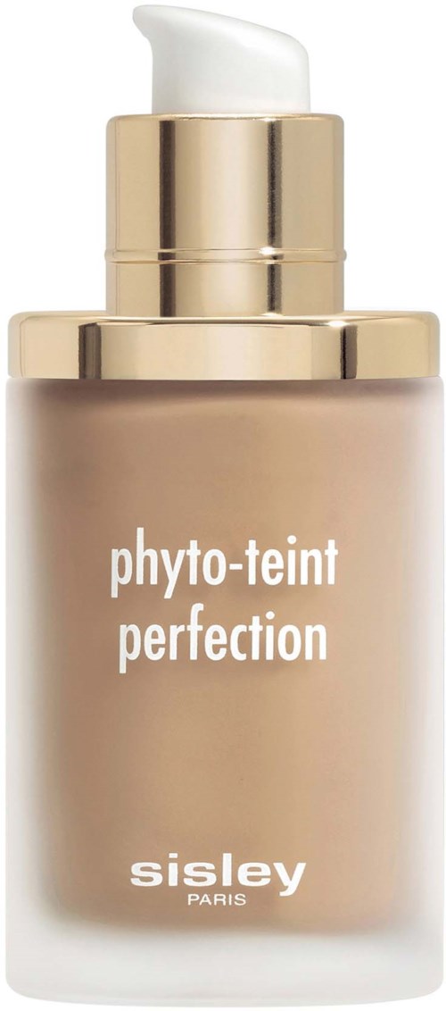 A bottle of foundation with a pump, beige color, gold cap, and white text. It is labeled 'phyto-teint perfection' by Sisley.