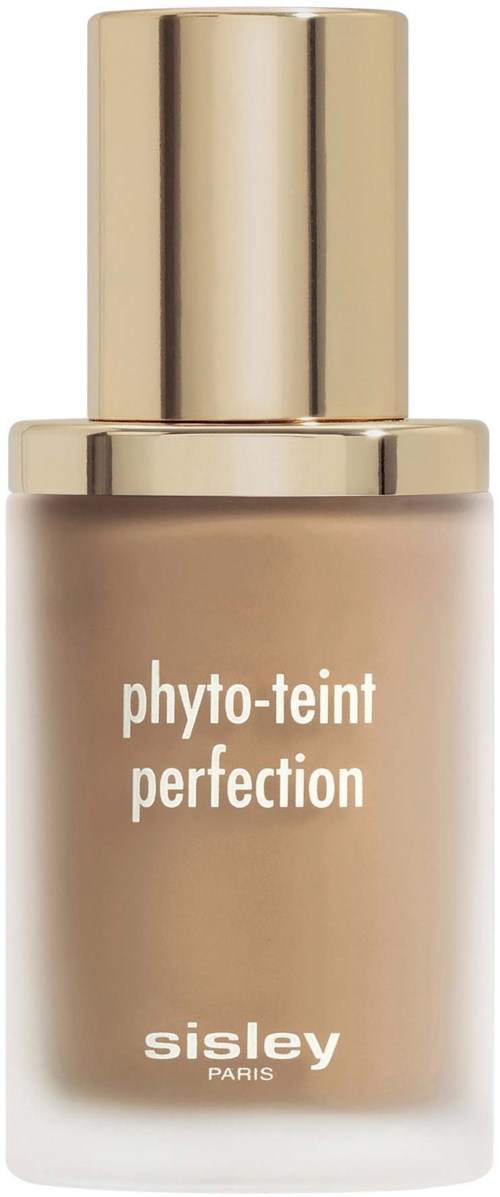A beige bottle of Sisley Perfection skin foundation with a gold cap.