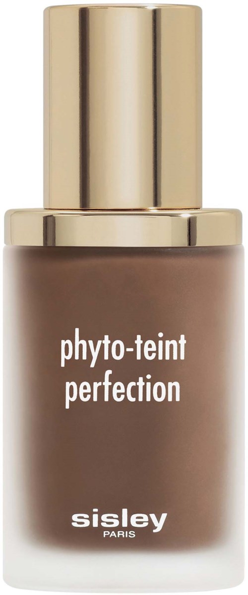 A bottle of foundation with a beige shade, labeled 'phyto-teint perfection' by Sisley Paris, gold cap.