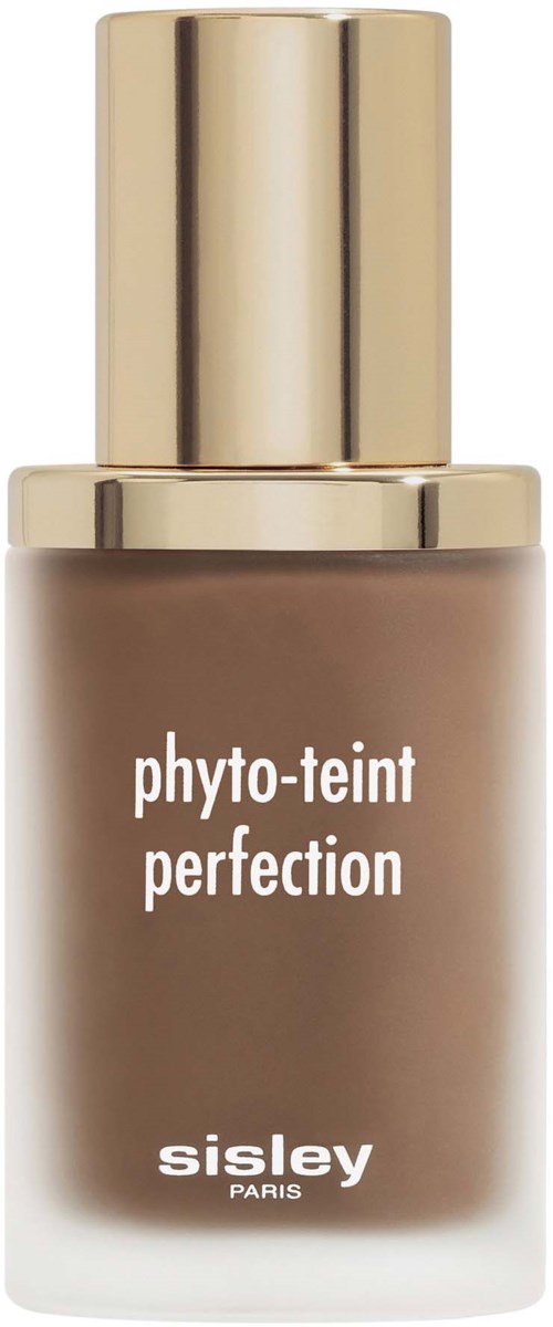 A bottle of foundation with a gold cap and brown liquid. It has the words "phyto-teint perfection" and "sisley Paris."