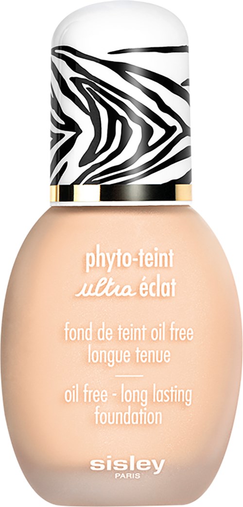 Beige meikkipullo, jossa on mustavalkoinen leopardikuvioinen korkki, merkitty 'Sisley Paris' ja 'oil free - long lasting.'