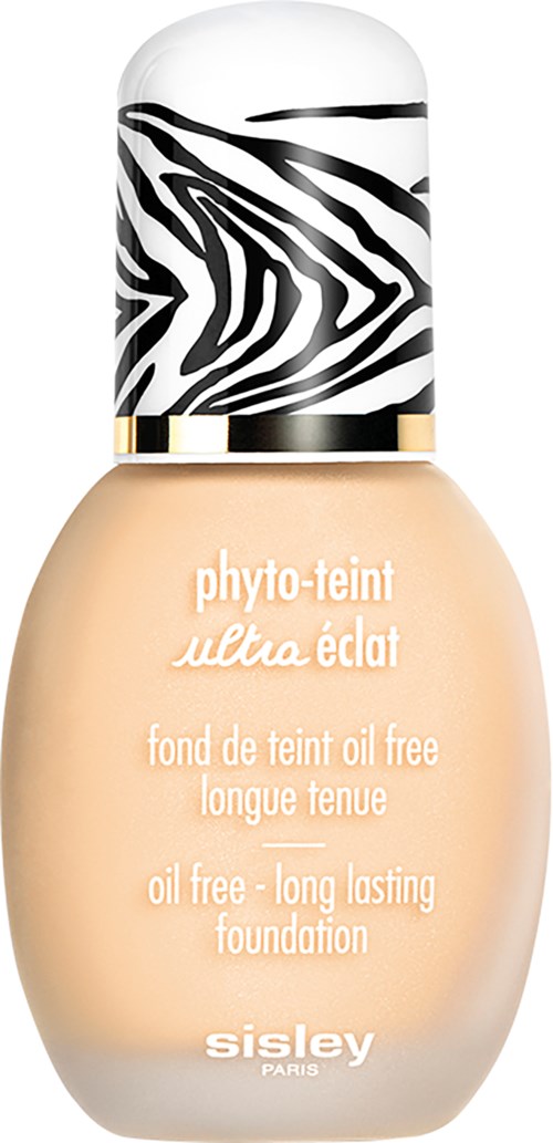 A bottle of oil-free long-lasting foundation with a zebra-patterned cap and beige liquid inside.