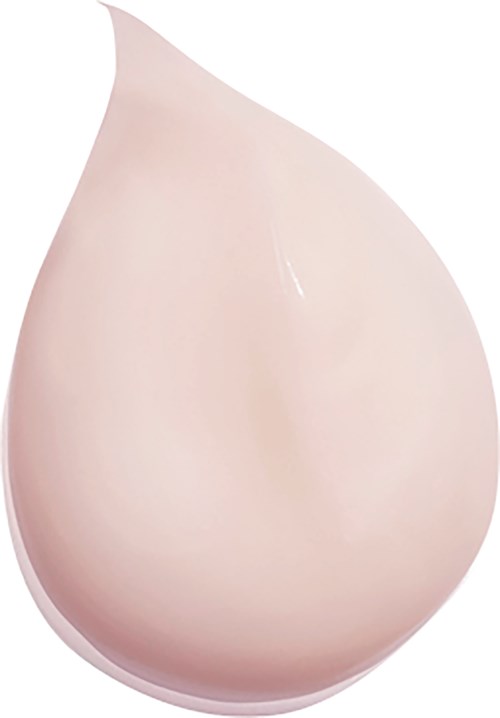 En stor, slät, ljus rosa eller beige kosmetikflaska med en kurvad hatt och glänsande yta.