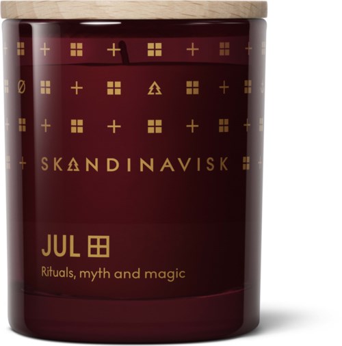 En mørkerød lysbeholder med guld symboler og tekst, som sier 'SKANDINAVISK' og 'JUL' med juletema.