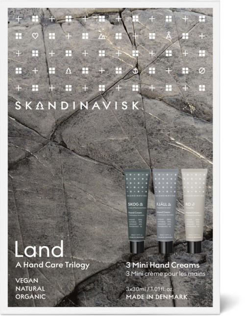 Tre mini håndkremer i rør vises med en steinbakgrunn, feirer skandinavisk håndpleie, vegansk, naturlig, økologisk.