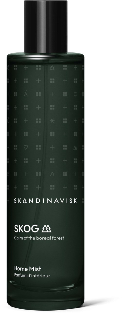 Een lange, donkergroene fles met 'SKANDINAVISK SKOG' label en zwart deksel, voor gebruik binnen.