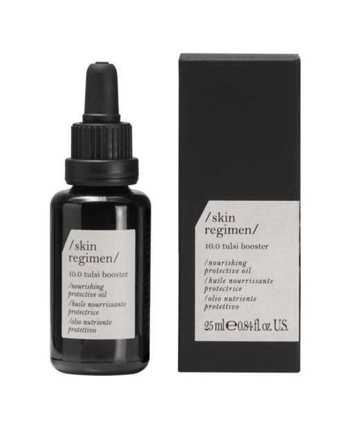 En liten svart flaska med pipett och en svart låda, båda märkta 'Skin Regimen' näringsrik skyddande olja, 25 ml.