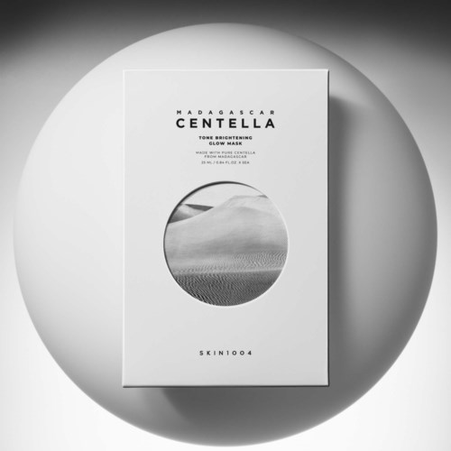 Eske med tekst om Madagascar Centella og en liten sirkel med sanddyner.