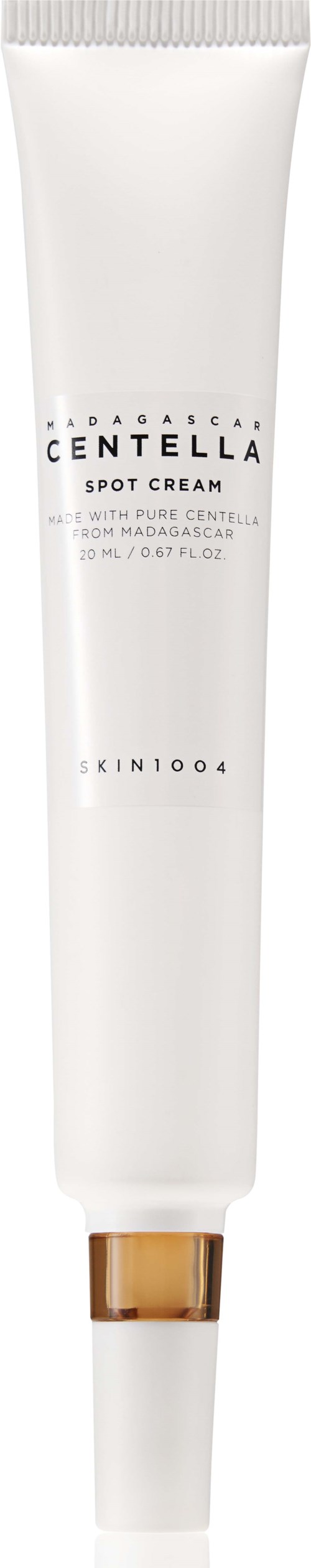 A white tube with a gold cap labeled 'Madagascar Centella Spot Cream' for skin treatment.