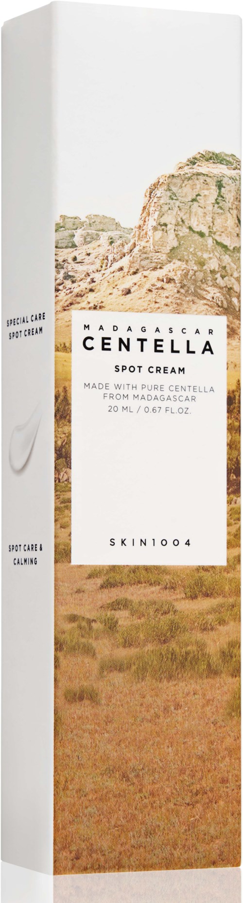 A tall box with images of rocky and grassy landscapes, containing Madagascar Centella spot cream.