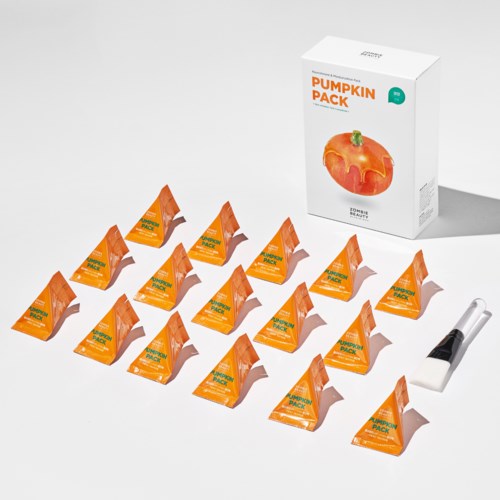 Bildet viser en pumpeformet produktpakke med oransje emballasje, en hvit boks merket 'PUMPKIN PACK' og en liten enhet.