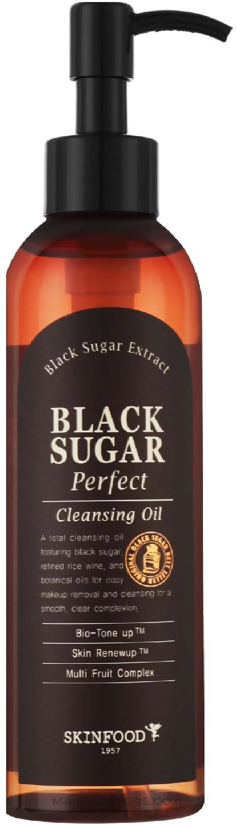 A dark orange bottle with a black pump labeled 'Black Sugar Perfect Cleansing Oil' for skincare.