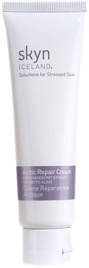 En vit tube märkt Skyn Iceland, Arctic Repair Cream, för stressad hud, med blåbärsextrakt och arktalger.