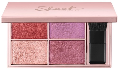 En rosa makeup-palett med fyra rougefärger och en liten borste.