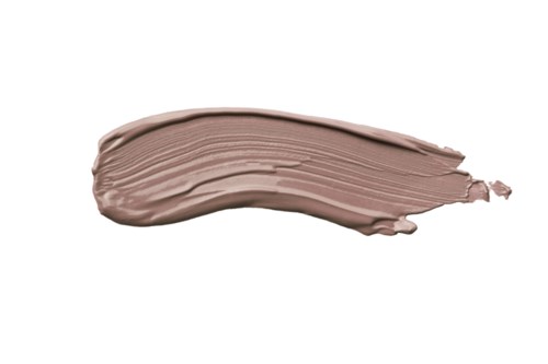 En stribe lysebrun cremet makeup eller maling spredt på en hvid baggrund.