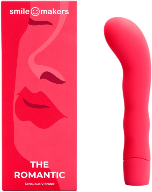 En lyserød æske med et smilende ansigt og røde læber, og en lyserød bøjet vibrator ved siden af. Æsken hedder 'The Romantic'.