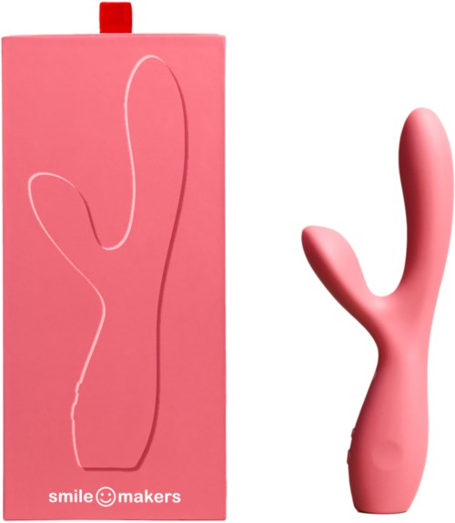 Lyserød vibrator med en buet form og matchende lyserød æske mærket 'smile makers'.