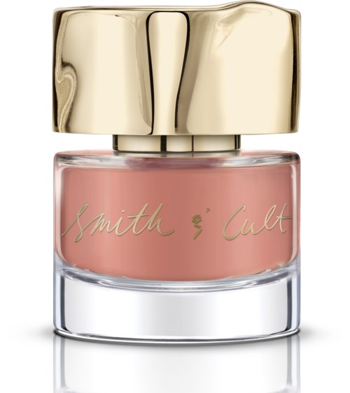 A small perfume bottle with a gold top and pink label reading 'Smith & Cult.'