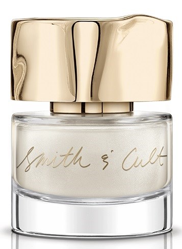 A perfume bottle with a gold cap and glass body, labeled 'Smith & Cult'.
