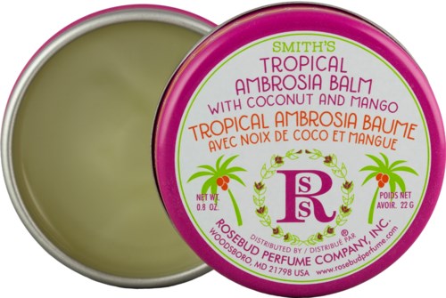 En rund behållare med rosa kanter, märkt 'Smith's Tropical Ambrosia Balm' med doft av kokos och mango, öppen för att visa balmet.