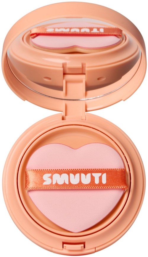 A pink compact with a heart-shaped sponge and an orange ribbon with the word "SMOOTH" on it.