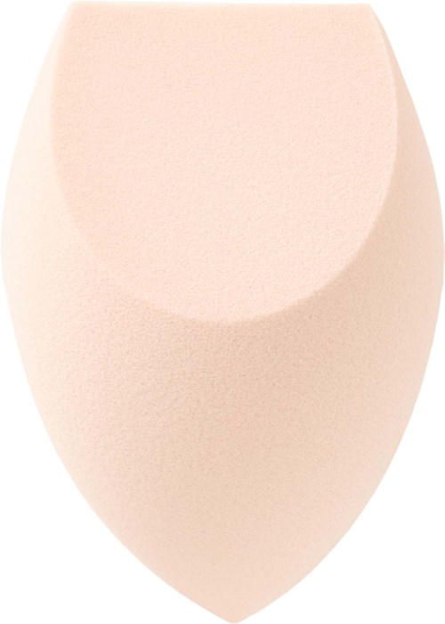 En beige sminksvamp med rund form och slät yta.