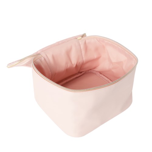 Auki pinkki meikkipussi vaalean sisuksen ja vetoketjun kanssa.