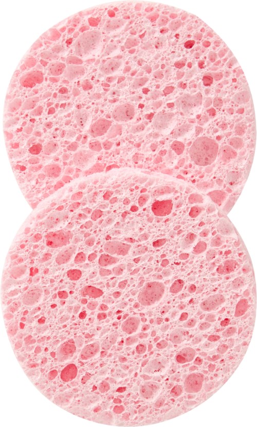 Två runda rosa svampaktiga föremål med många hål, delvis staplade på varandra.