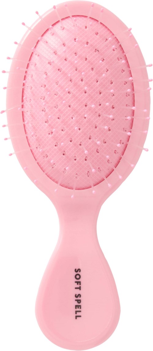 Rosa hårbørste med rund oval form, myke børster og håndtak merket 'SOFT BRUSH.'