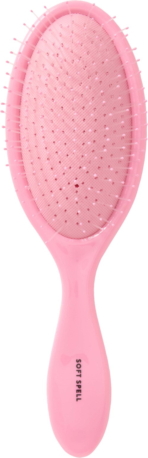 Pink hairbrush with a long handle and small bristles. The handle has the text 'SOFT BRUSH'.