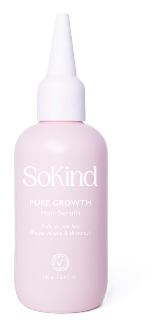 Een roze fles met een witte druppelkraag met label 'SoKind Pure Growth Hair Serum' voor haarverzorging en haargroei.